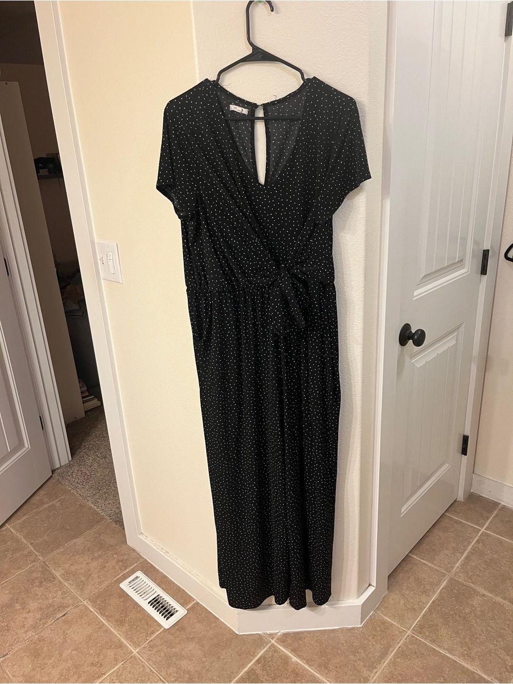 Maurices Black Jumpsuit with White Polka Dots and knot detail